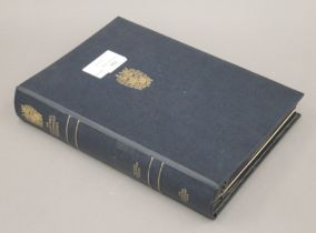 A portfolio of Churchill silver crowns. 21.5 cm wide.