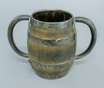 A sterling silver mounted wooden barrel-form twin-handled tankard. 1.5 cm high.