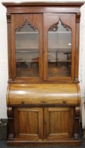A Victorian mahogany cylinder bureau bookcase. 125 cm wide x 223 cm high.