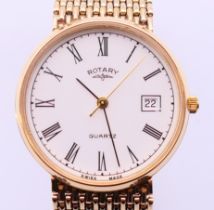 A Rotary gentleman's wristwatch on a 9 ct gold strap. 3.25 cm diameter. 59.9 grammes total weight.