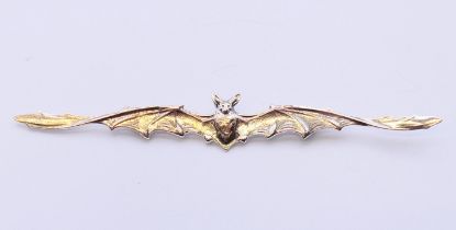 A silver bat brooch. 11.5 cm wide.