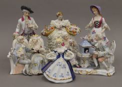 A collection of Continental porcelain figurines. The largest 25.5 cm high.