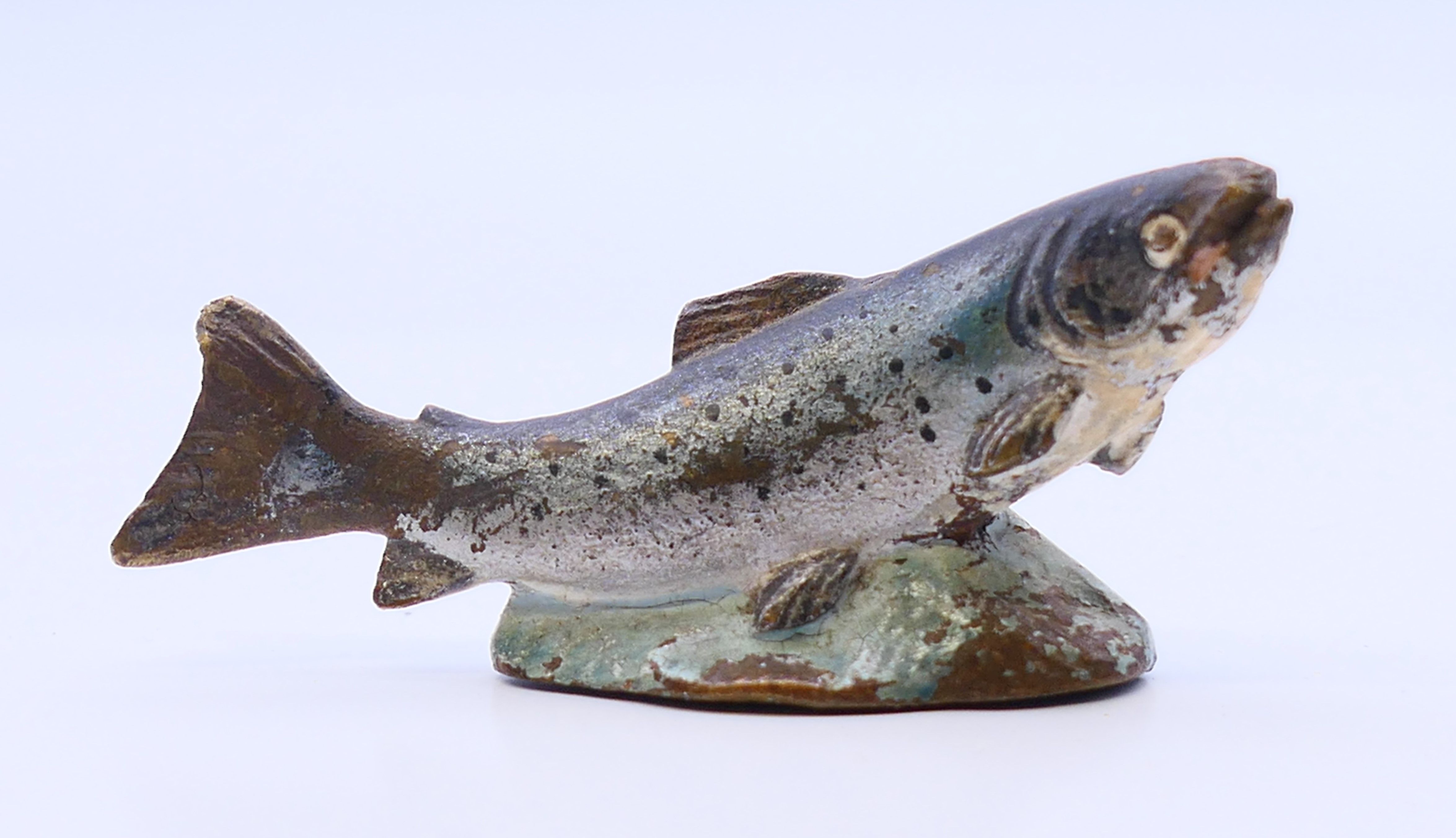 A cold painted bronze model of a salmon. 6 cm wide.