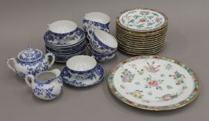 A Japanese blue and white tea set together with a quantity of Chinese famille rose plates.