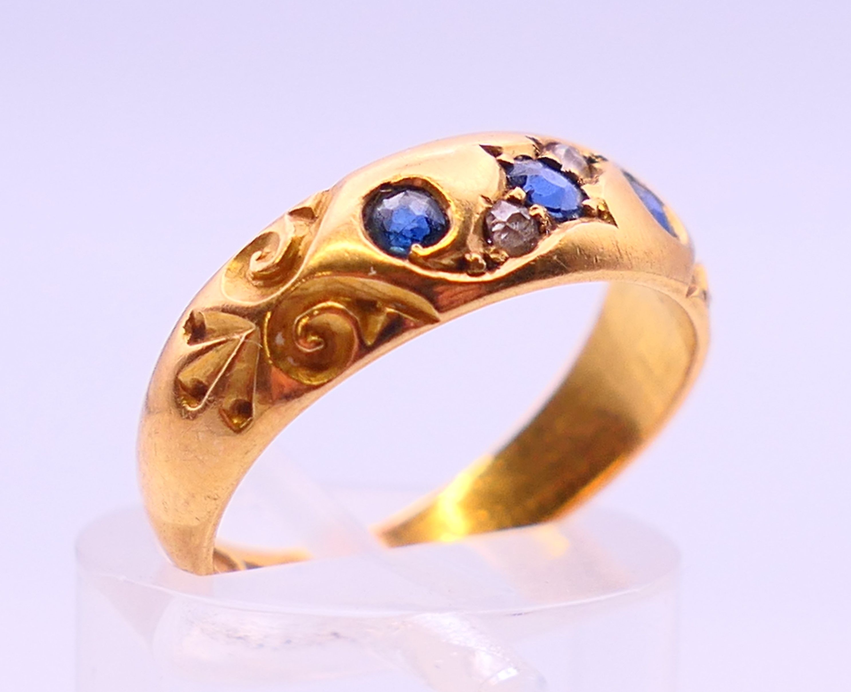 An 18 ct gold diamond and sapphire ring. 4 grammes. Ring size L/M. - Image 3 of 5