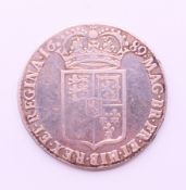 An 1689 silver coin.