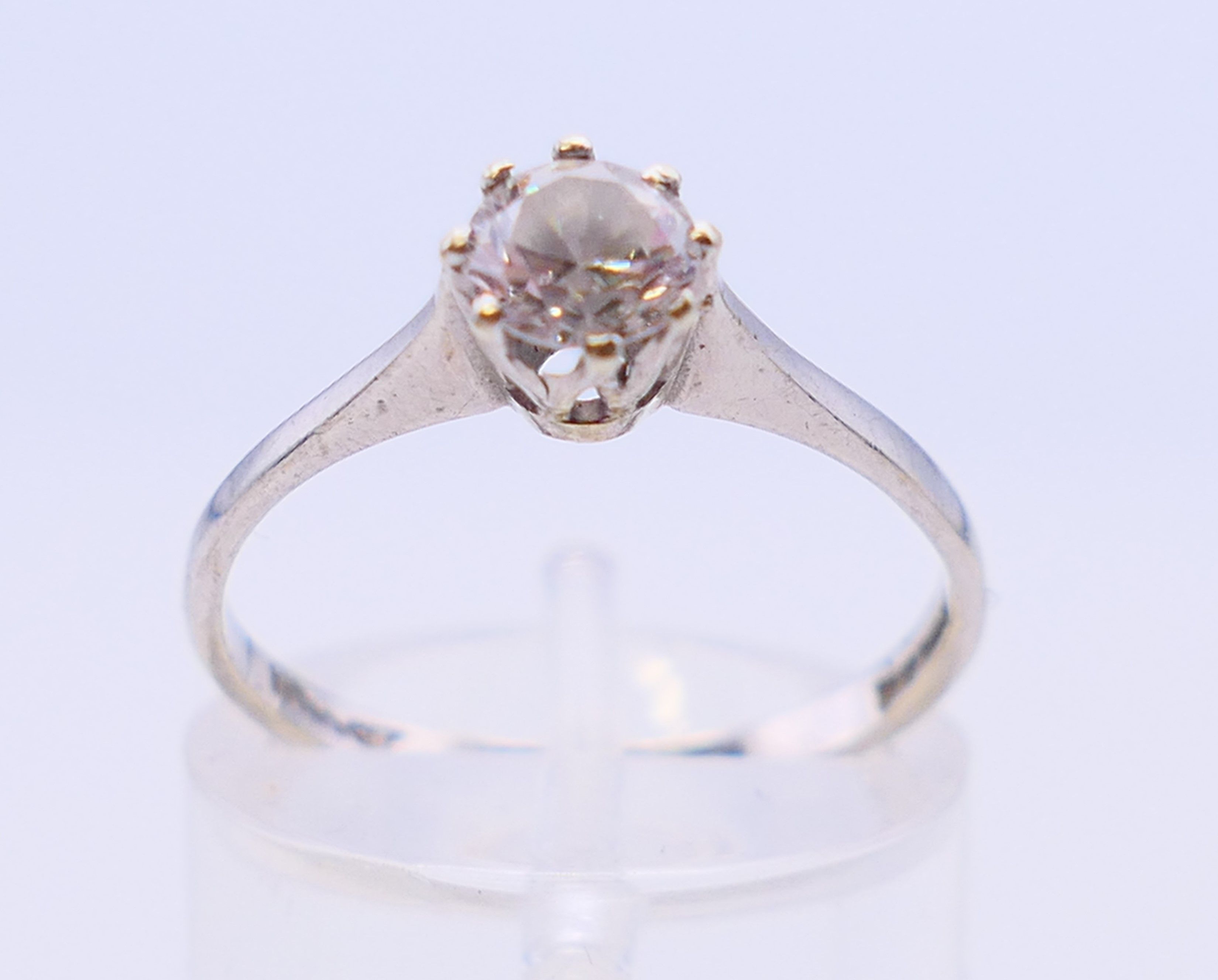 A 9 ct white gold cubic zirconia solitaire ring. Ring size N/O.