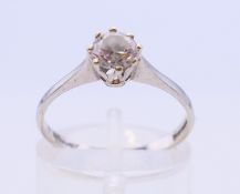 A 9 ct white gold cubic zirconia solitaire ring. Ring size N/O.