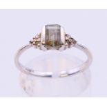 A 9 ct white gold diamond ring. Ring size O.