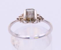 A 9 ct white gold diamond ring. Ring size O.