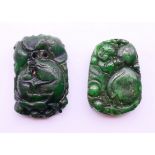 Two jade carved pendants. Largest 5.5 cm high.