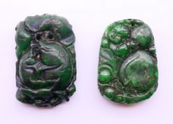 Two jade carved pendants. Largest 5.5 cm high.