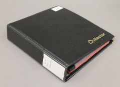 A coin collection in folder. The folder 21 cm wide.