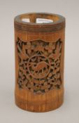 A late 19th/early 20th century Chinese bamboo brush pot. 18.5 cm high.