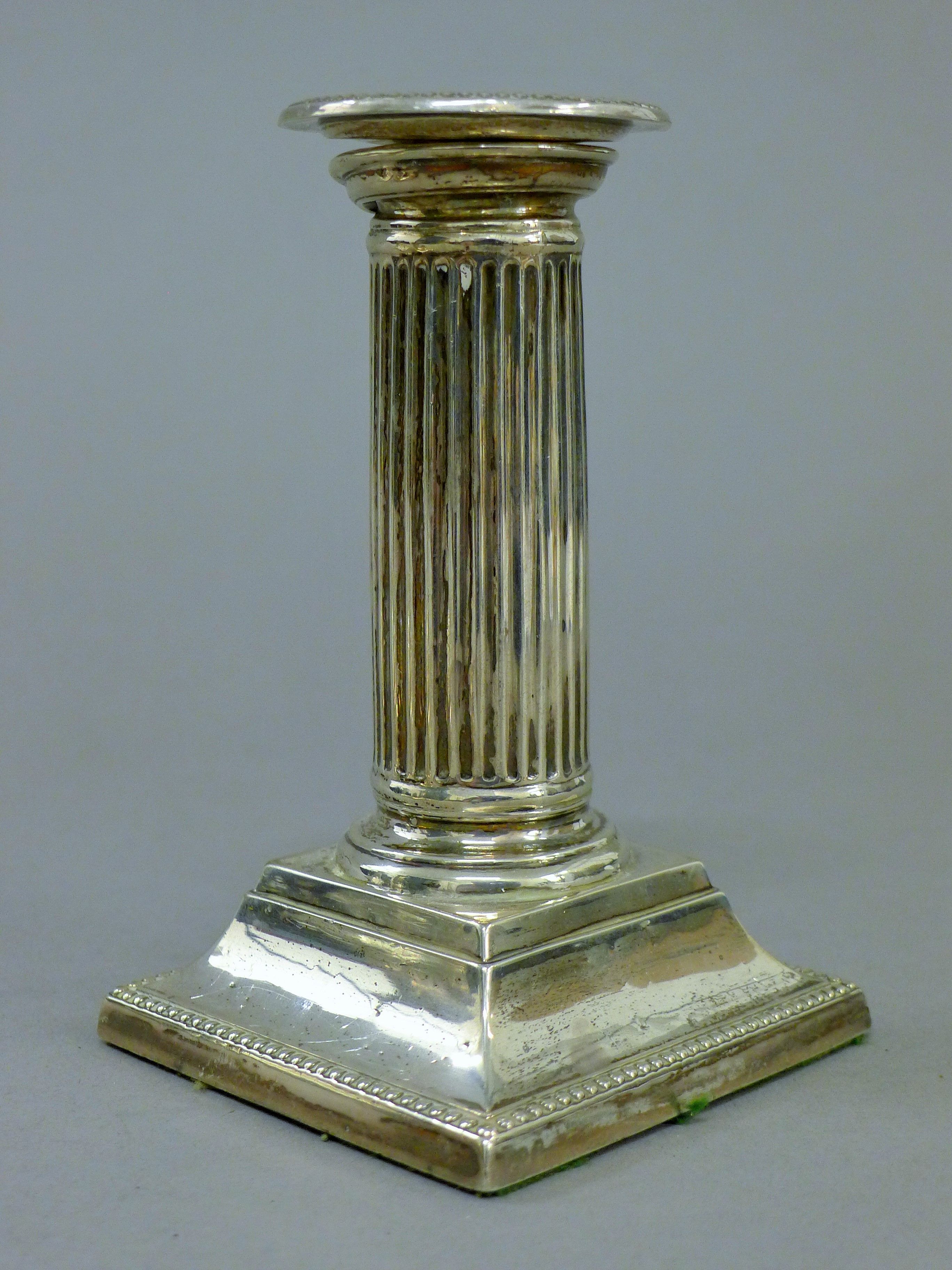 A pair of silver candlesticks. 12.5 cm high. - Image 3 of 4