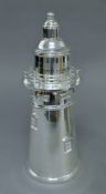 A silver-plated lighthouse cocktail shaker. 35 cm high.