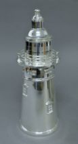 A silver-plated lighthouse cocktail shaker. 35 cm high.