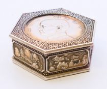 A Chinese octagonal coin box. 5 cm wide.