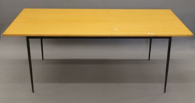 A mid-20th century table with iron legs. 183 cm long x 92 cm wide.