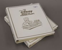 The Disney World of Postage Stamps two volumes. 28 cm wide.