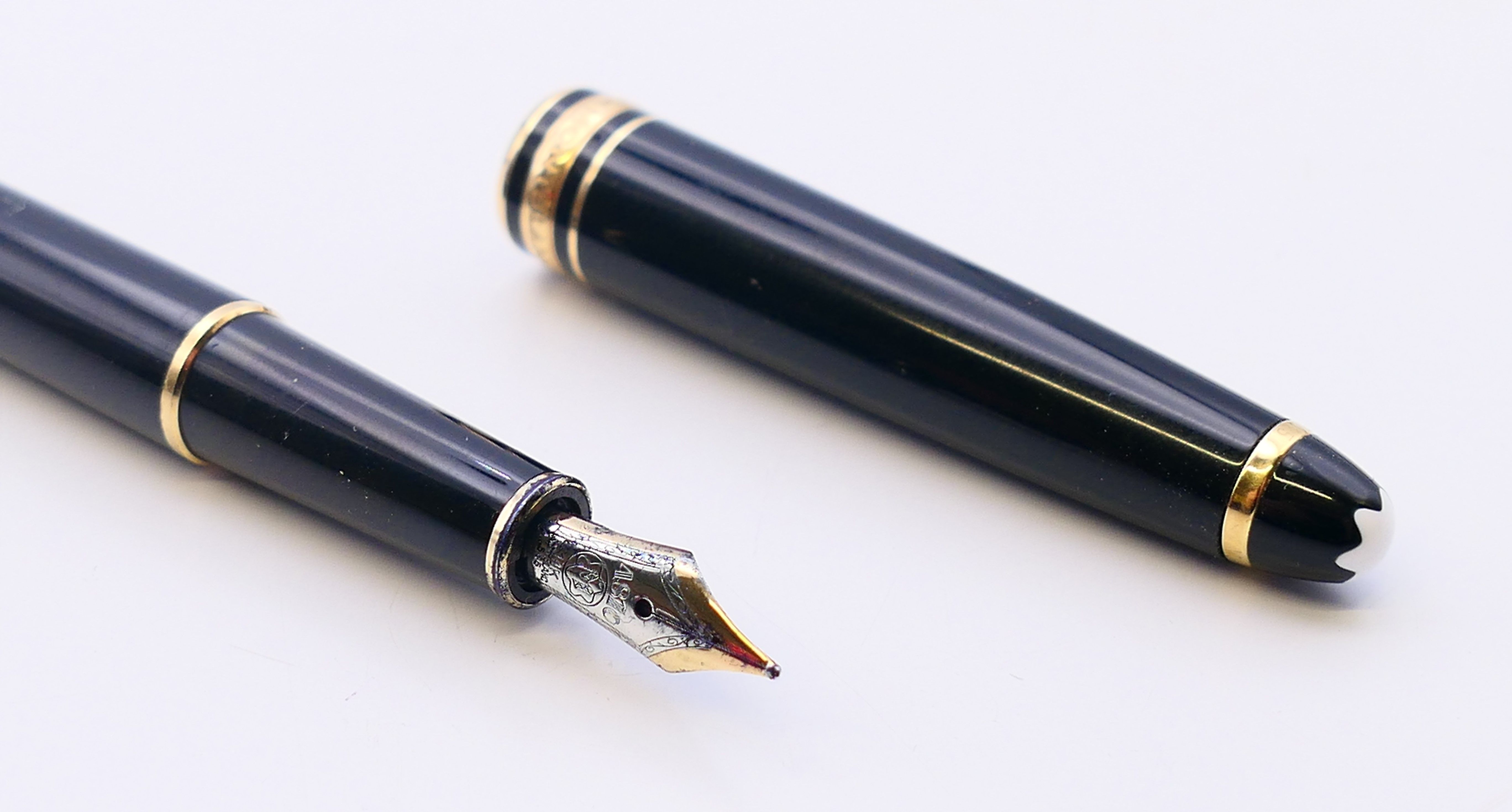 A Montblanc (Mont Blanc) Meisterstuck fountain pen with 14 ct gold Montblanc nib, numbered FB167025. - Image 2 of 8
