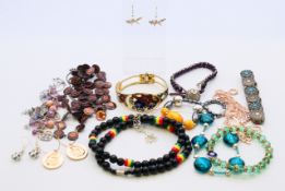 A quantity of various jewellery, including bracelets, necklaces and earrings.