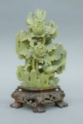 An Oriental soapstone carving. 23 cm high.