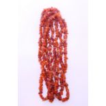 An amber necklace. Approximately 200 cm long.