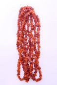 An amber necklace. Approximately 200 cm long.