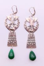 A pair of silver and jade Egypt revival earrings. 7 cm high.