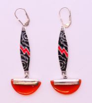 A pair of silver and carnelian Art Deco style earrings. 5 cm high.