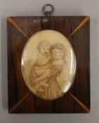 An early 19th century portrait of two children, watercolour and pencil, in a rosewood inlaid frame.