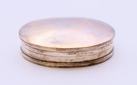 A silver hallmarked pill box. 3.5 cm x 2.75 cm.