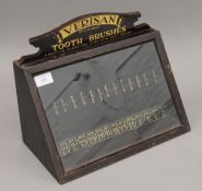A vintage shop's advertising cabinet for Verisan toothbrushes. 35 cm wide.