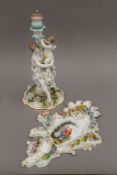 Two pieces of 19th century Dresden porcelain: a candle stick and a wall pocket.