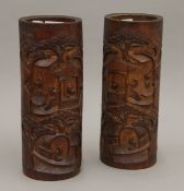 A pair of large 19th/20th century bamboo brush pots. Each 29 cm high.