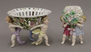 Two Continental porcelain baskets formed from putto. The largest 17 cm high.