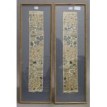 A pair of Chinese embroidered silk panels, framed and glazed. Each 9.5 x 50.5 cm.