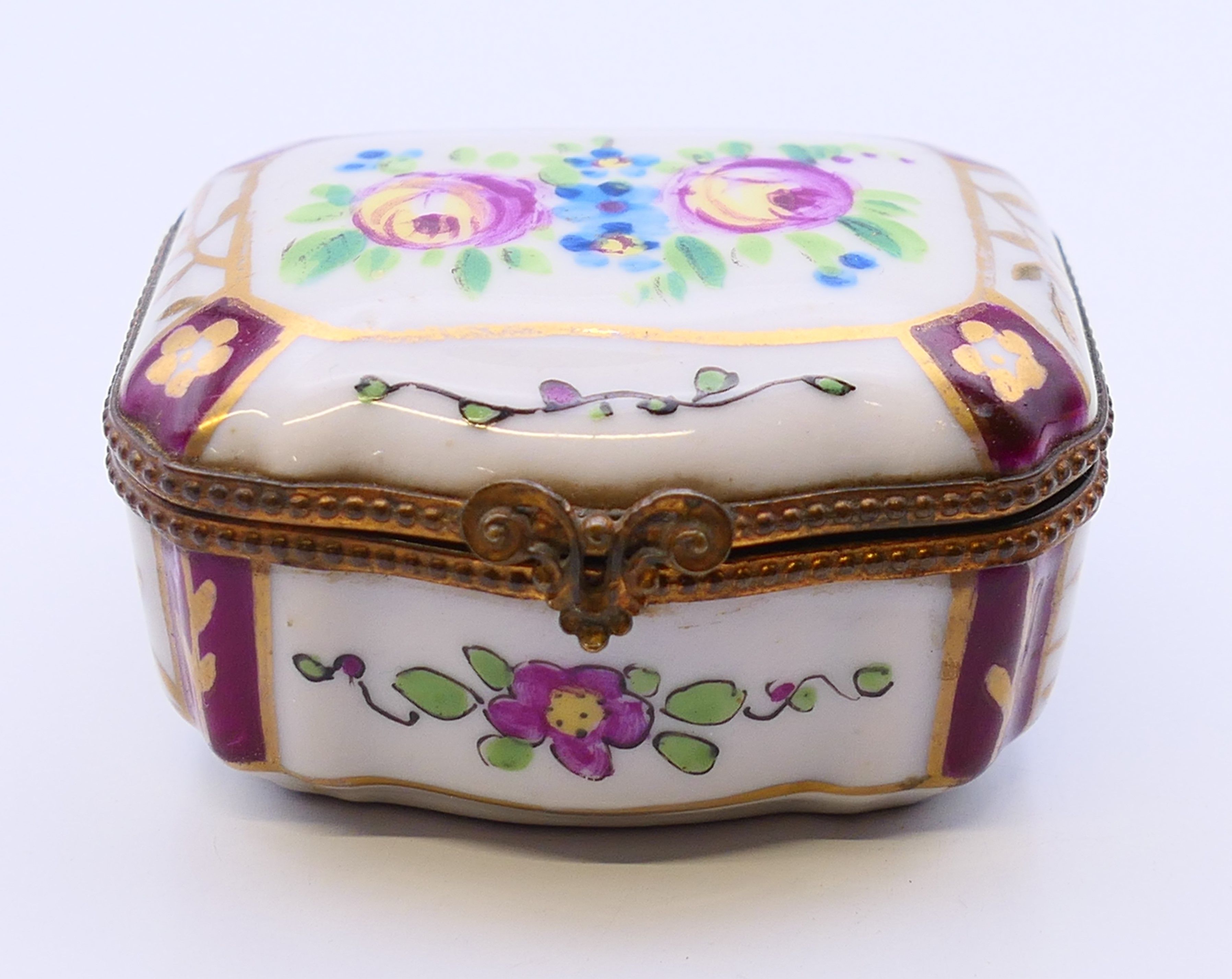 Three small decorative pill boxes, one porcelain, two enamel. The largest 6 cm x 5 cm. - Image 2 of 17