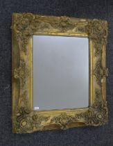 A large gilt framed mirror. 93 x 109 cm.