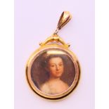 An antique 9 ct gold open locket. 3 cm diameter.