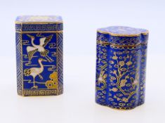 Two cloisonne lidded boxes. The largest 6 cm high.