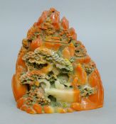 A model of a Chinese boulder carving. 16 cm high.