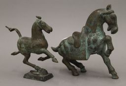Two bronze models of horses. The largest 21 cm high.