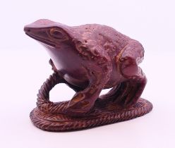 A Japanese model of a frog. 4 cm high.