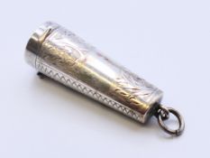 A silver cheroot holder case containing a 9 ct gold edged holder. Case 4 cm high.