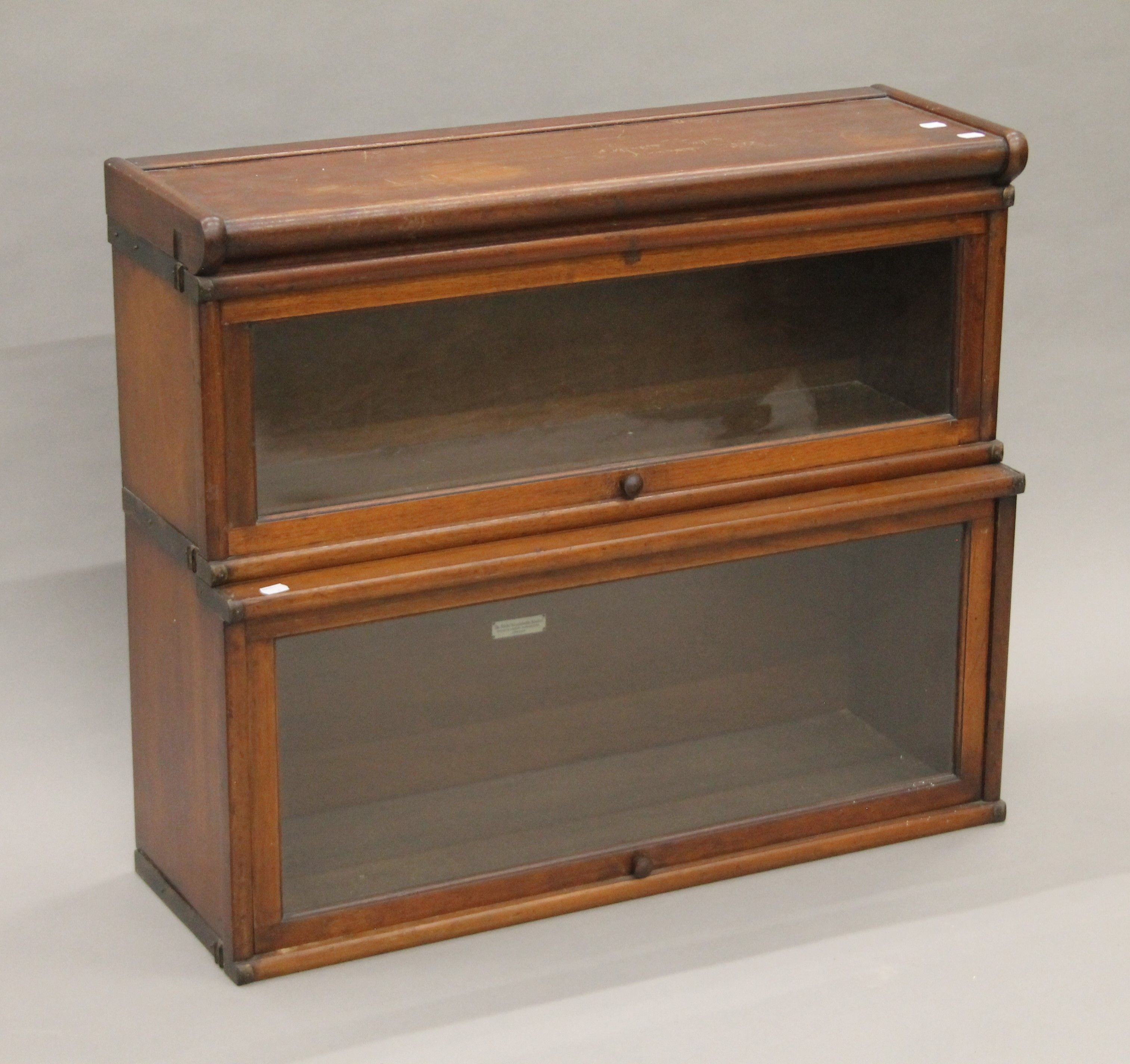 A two-stack mahogany Globe Wernicke bookcase. 86 cm wide, 73 cm high, 29 cm deep. - Image 2 of 7