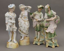 Two pairs of 19th century Continental porcelain figurines. The largest 44 cm high.