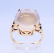 A 9 ct gold moonstone ring. 6.12 grammes. Ring size T.