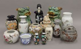 A quantity of various Oriental ceramics. The largest 27 cm high.